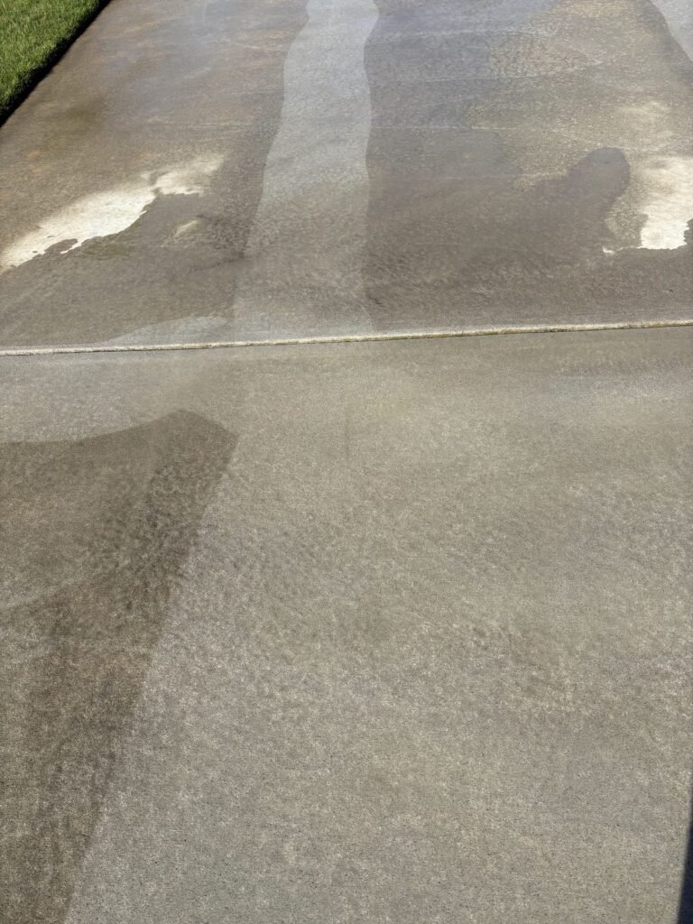 Driveway pressure washing showing before and after