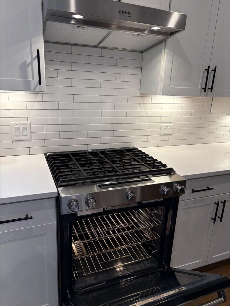 Kitchen stove and range hood after deep cleaning