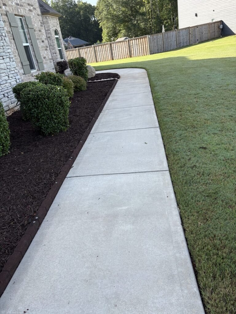 Sidewalk after pressure washing